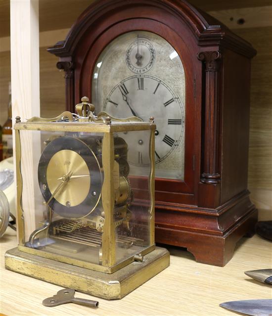 A German mahogany mantel clock and a brass chiming clock